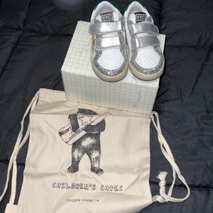 Toddler golden goose lightly used